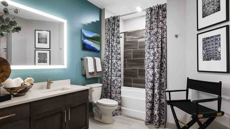 Spacious Bathroom with Custom Vanity and LED Mirror